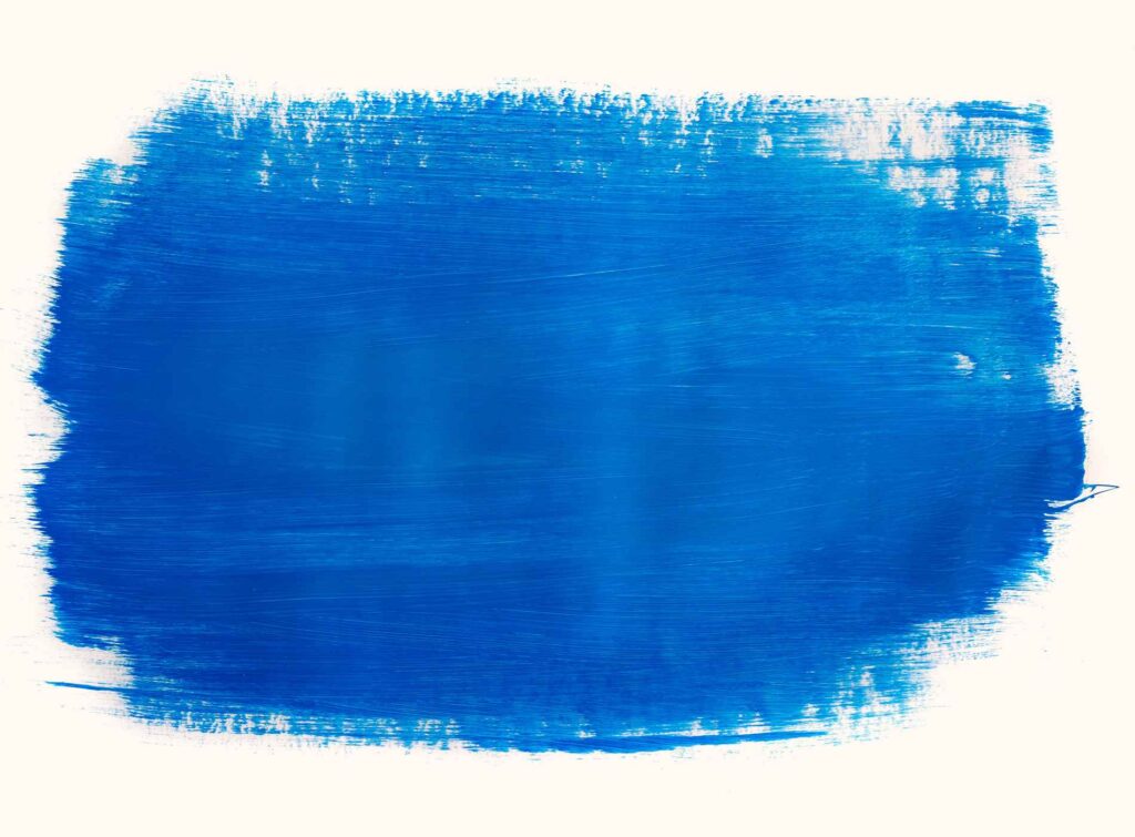 Blue color paint stain on a white wall - home decoration concepts