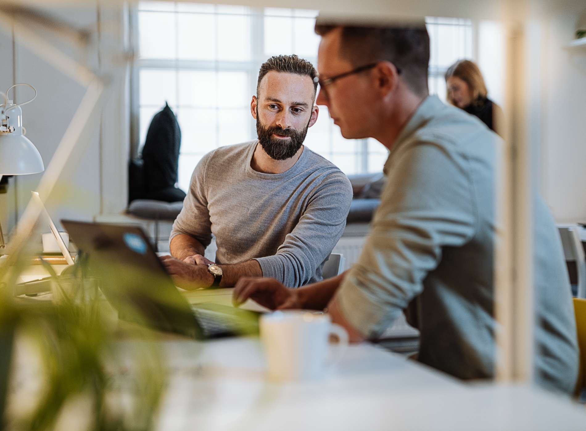 Diverse entrepreneurs and small business owners working in coworking space.Programmers and software engineers working in office