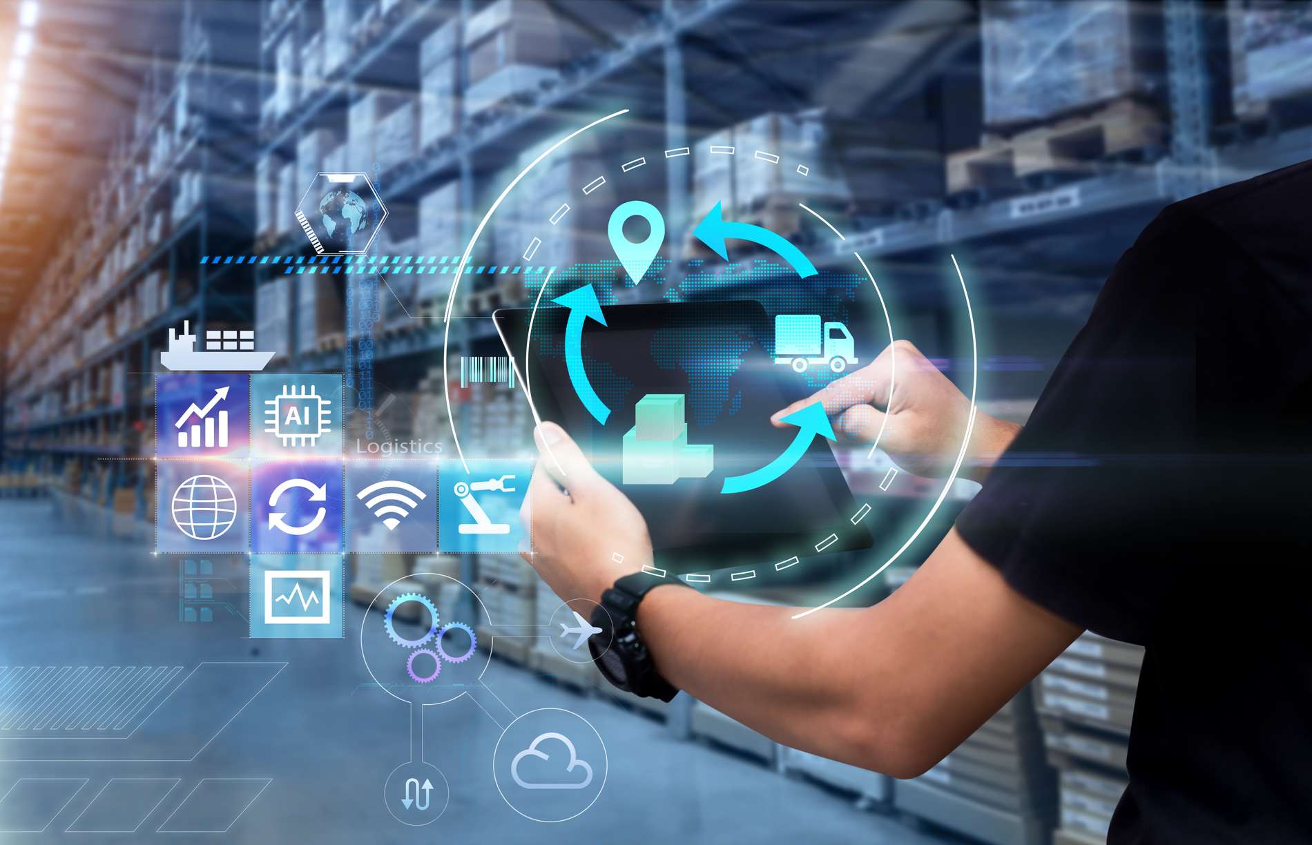 Business Logistics technology concept.Man hands using tablet on blurred warehouse as background