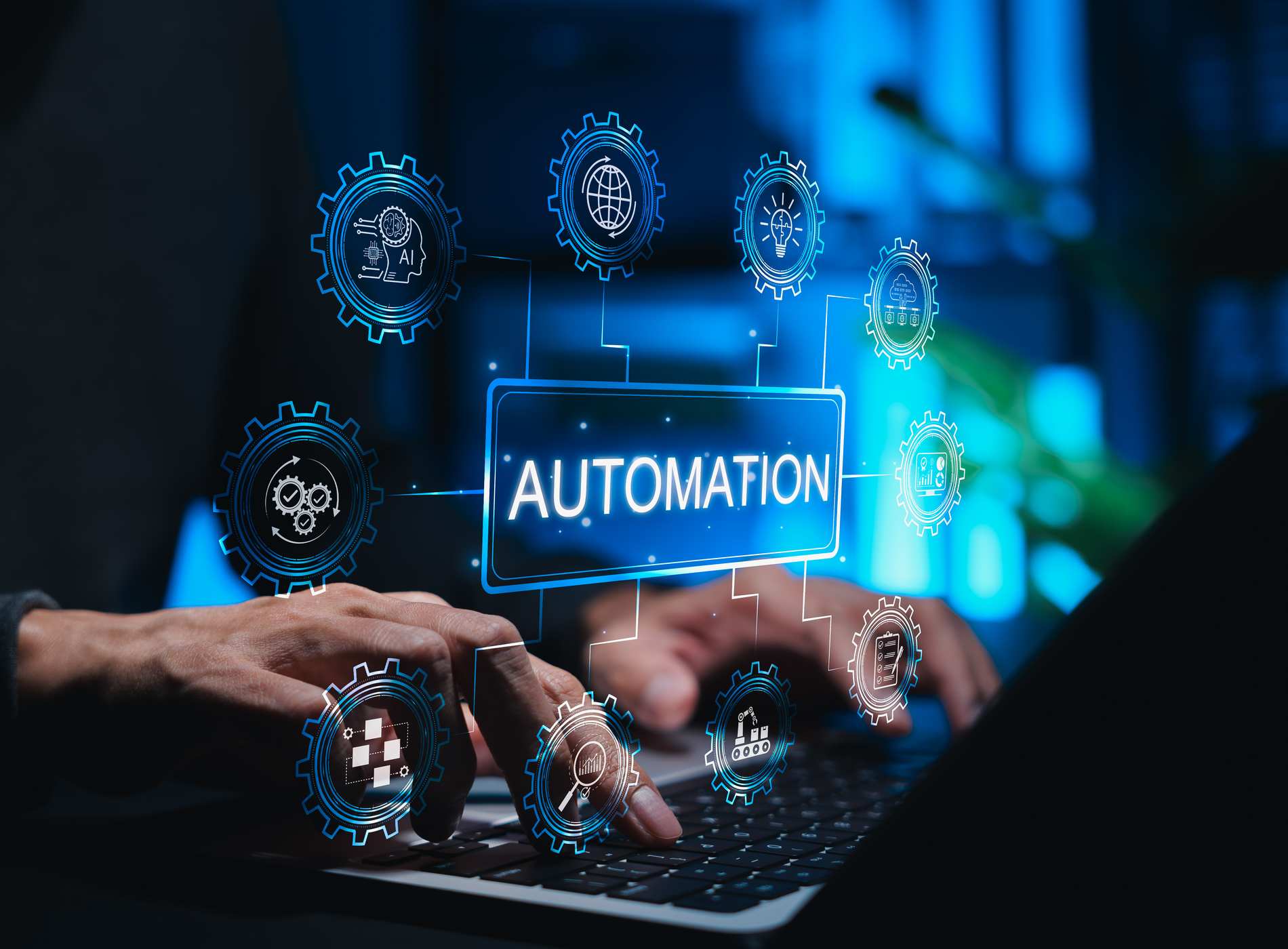 Automation concept in technology and business. Person using laptop while gear icons symbolizing AI, workflow automation, data analysis, cloud computing, and smart industry surround AUTOMATION label.
