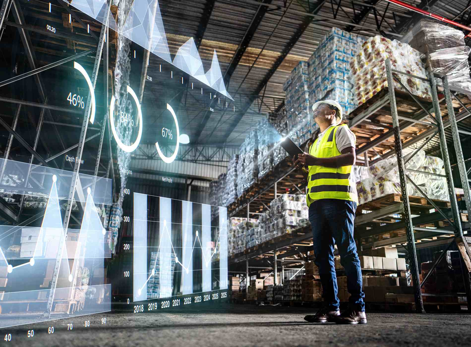 Employee analyzing virtual data with augmented reality interface in a warehouse