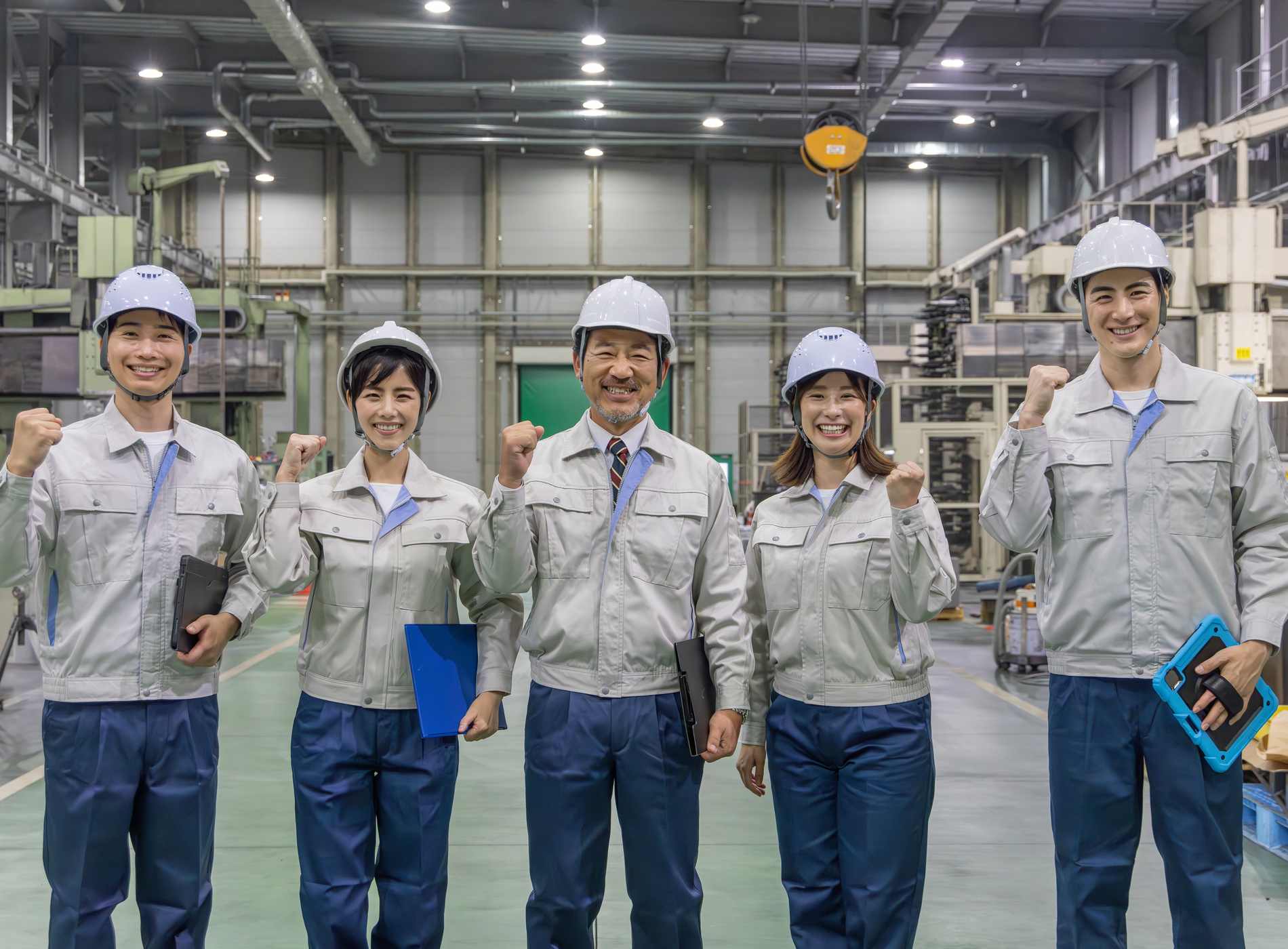 Group of Asian people working in a factory